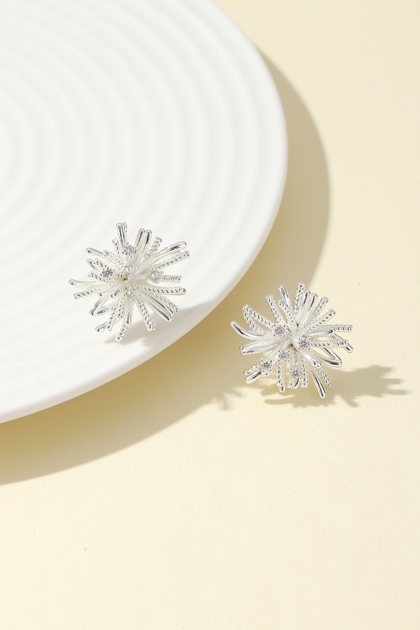 Shimmering stud earrings, silver snowflake stud earrings, dazzling earring charms